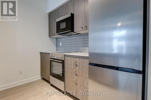 209 - 25 Wellingtont Street S, Kitchener, ON - Indoor Photo Showing Kitchen With Stainless Steel Kitchen