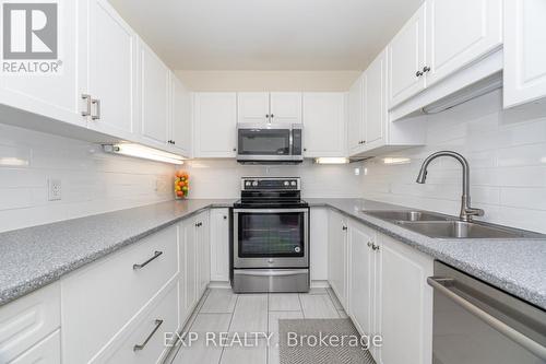 619 - 2075 Amherst Heights Drive, Burlington, ON - Indoor Photo Showing Kitchen With Stainless Steel Kitchen With Double Sink