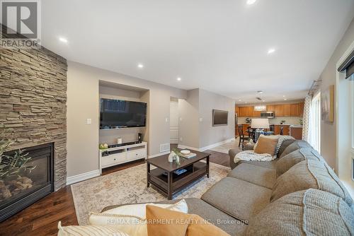 1351 Mcguffin Gate, Milton, ON - Indoor Photo Showing Living Room With Fireplace