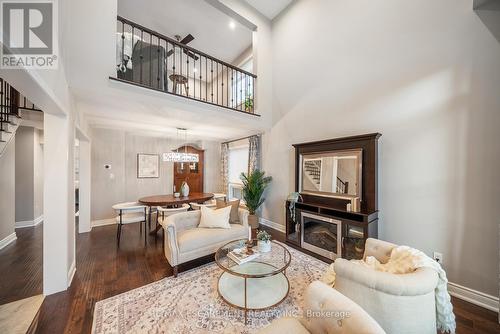 1351 Mcguffin Gate, Milton, ON - Indoor Photo Showing Living Room With Fireplace