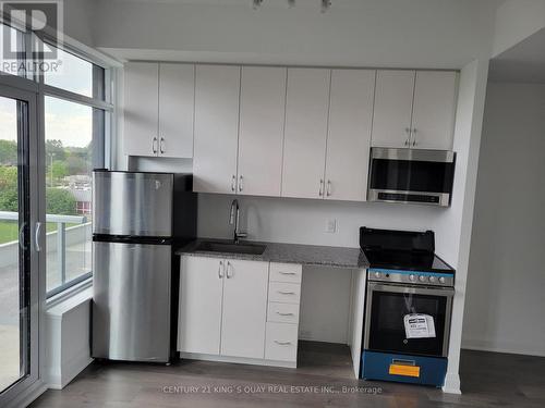 220 - 3220 Sheppard Avenue E, Toronto, ON - Indoor Photo Showing Kitchen