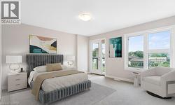 Carpeted bedroom with baseboards and access to outside - 