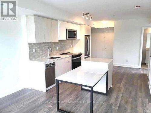 302 - 1461 Lawrence Avenue W, Toronto, ON - Indoor Photo Showing Kitchen With Upgraded Kitchen