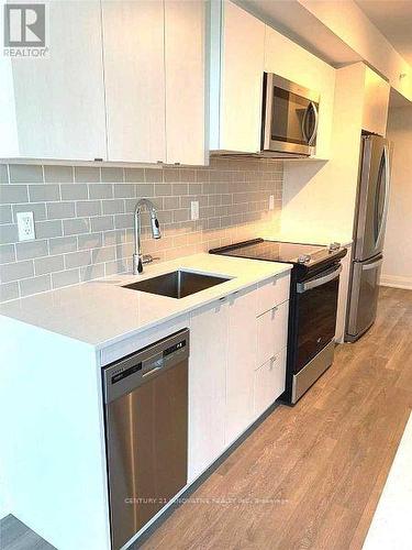 302 - 1461 Lawrence Avenue W, Toronto, ON - Indoor Photo Showing Kitchen With Upgraded Kitchen