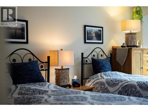 595 Yates Road Unit# 61, Kelowna, BC - Indoor Photo Showing Bedroom