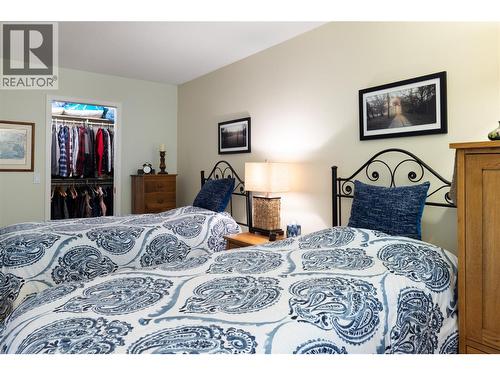 595 Yates Road Unit# 61, Kelowna, BC - Indoor Photo Showing Bedroom