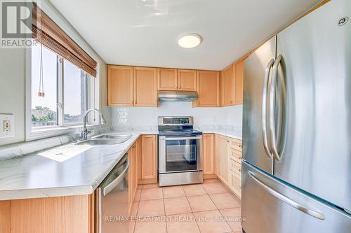 63 - 1489 Heritage Way, Oakville, ON - Indoor Photo Showing Kitchen With Stainless Steel Kitchen With Double Sink