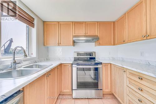 63 - 1489 Heritage Way, Oakville, ON - Indoor Photo Showing Kitchen With Double Sink