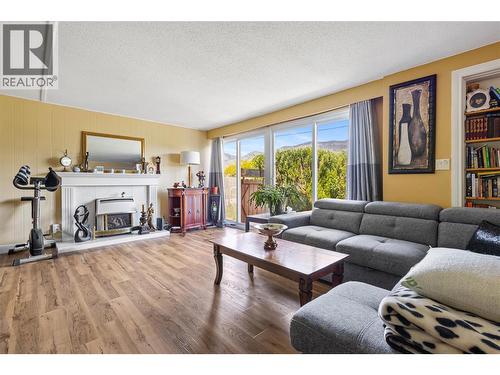8 Rose Place, Osoyoos, BC - Indoor Photo Showing Living Room With Fireplace