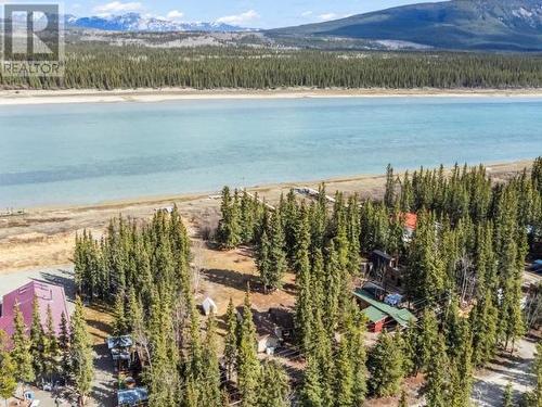 8 Tagish River Road, Whitehorse South, YT - Outdoor With Body Of Water With View
