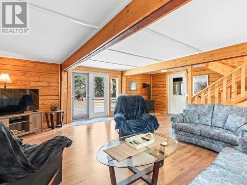 8 Tagish River Road, Whitehorse South, YT - Indoor Photo Showing Living Room With Fireplace