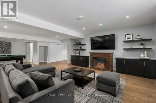 25 Springdale Drive, Kawartha Lakes, ON - Indoor Photo Showing Living Room With Fireplace