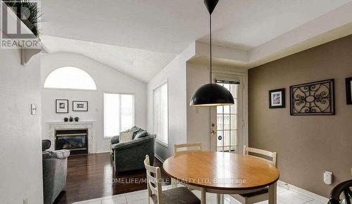 12 Willow Park Drive, Brampton, ON - Indoor Photo Showing Dining Room With Fireplace