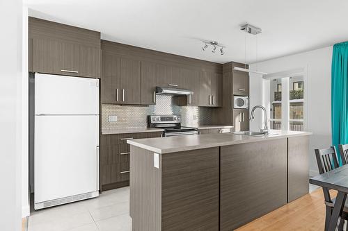 Cuisine - 8601 Boul. St-Jacques, Québec (Les Rivières), QC - Indoor Photo Showing Kitchen With Double Sink