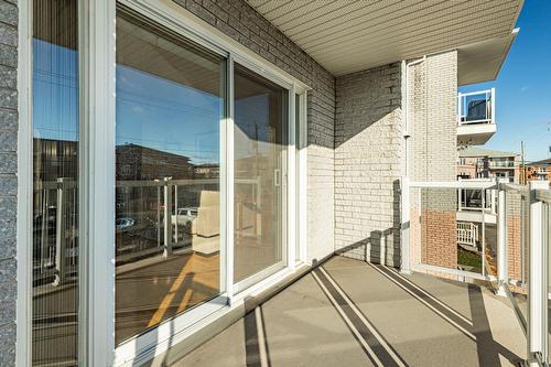 Balcon - 204-2385 Rue Henriette-Céré, Longueuil (Saint-Hubert), QC - Outdoor With Exterior