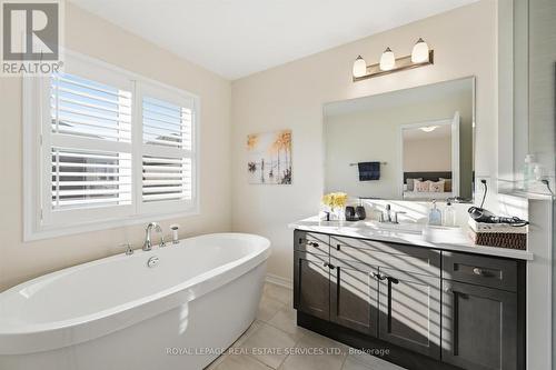 Primary Ensuite Features a Freestanding Soaker Tub - 3300 Jacob Way, Oakville, ON - Indoor Photo Showing Bathroom