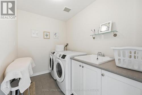 Convenient Upper Level Laundry Room - 3300 Jacob Way, Oakville, ON - Indoor Photo Showing Laundry Room