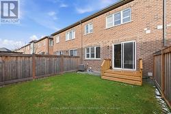 Living Room Walkout to Fully Fenced Backyard - 