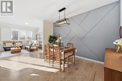 Stylish Dining Room with a Designer Feature Wall - 