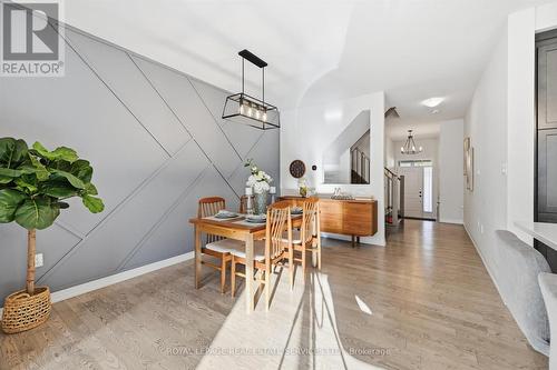 Stylish Dining Room with a Designer Feature Wall - 3300 Jacob Way, Oakville, ON - Indoor