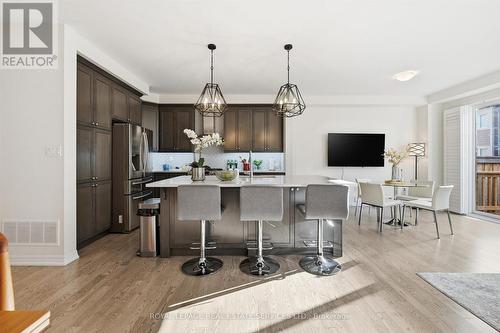 Kitchen with An Abundance of Soft-Close Cabinetry - 3300 Jacob Way, Oakville, ON - Indoor Photo Showing Kitchen With Stainless Steel Kitchen With Upgraded Kitchen