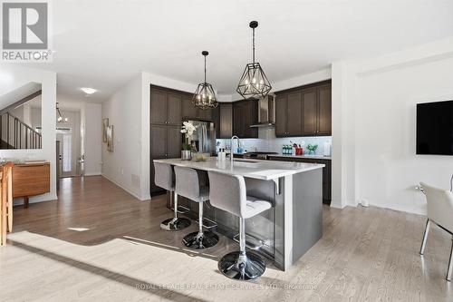 Gourmet Kitchen Showcases an Oversized Island - 3300 Jacob Way, Oakville, ON - Indoor Photo Showing Kitchen