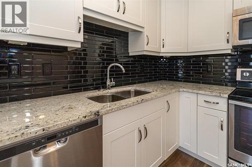 109 1015 Moss Avenue, Saskatoon, SK - Indoor Photo Showing Kitchen With Double Sink With Upgraded Kitchen