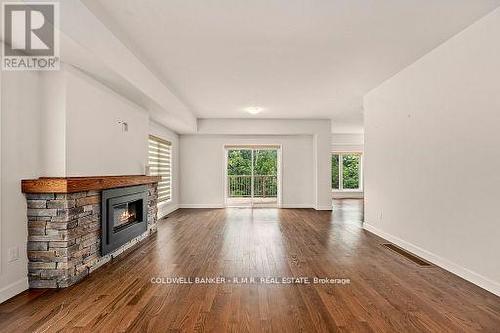 60 Alcorn Drive, Kawartha Lakes (Lindsay), ON - Indoor Photo Showing Living Room With Fireplace