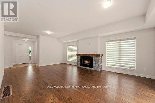 60 Alcorn Drive, Kawartha Lakes (Lindsay), ON - Indoor Photo Showing Living Room With Fireplace