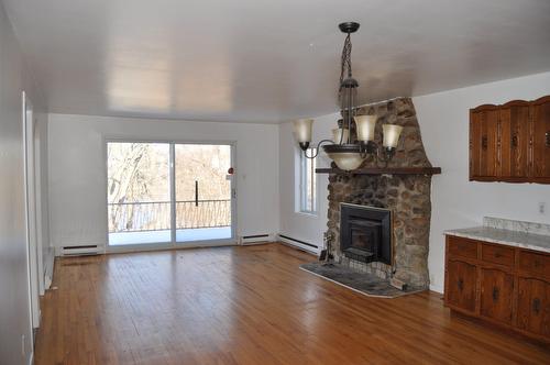 Salon - 3620 Rue St-Pierre O., Saint-Hyacinthe, QC - Indoor Photo Showing Living Room With Fireplace
