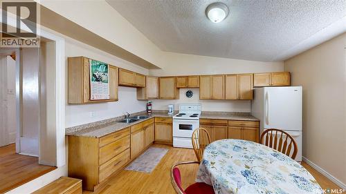 827 15Th Avenue, Regina, SK - Indoor Photo Showing Kitchen With Double Sink