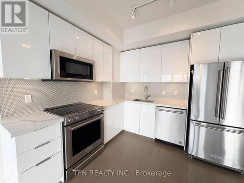 1502 - 20 Shore Breeze Drive, Toronto, ON - Indoor Photo Showing Kitchen With Stainless Steel Kitchen With Upgraded Kitchen