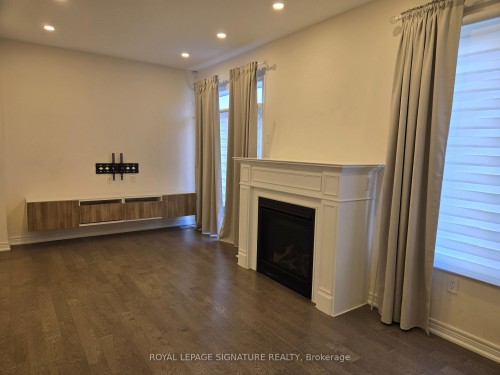 8 Beasley Grove, Hamilton, ON - Indoor With Fireplace