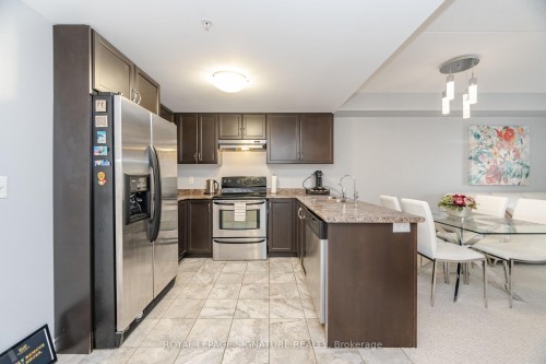111-67 Kingsbury Square, Guelph, ON - Indoor Photo Showing Kitchen With Double Sink
