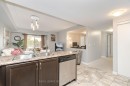 111-67 Kingsbury Square, Guelph, ON  - Indoor Photo Showing Kitchen With Double Sink 