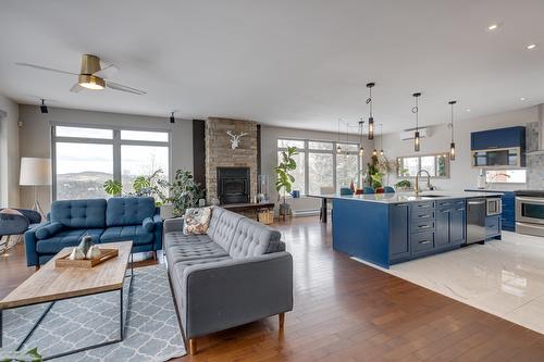 Living room - 955 Rue Des Cimes, Sainte-Adèle, QC - Indoor With Fireplace