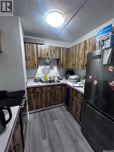 610 20 Kleisinger Crescent, Regina, SK - Indoor Photo Showing Kitchen With Double Sink