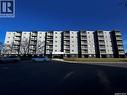 610 20 Kleisinger Crescent, Regina, SK  - Outdoor With Balcony With Facade 