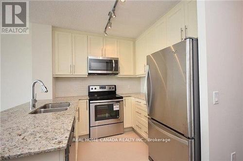 409 - 3975 Grand Park Drive, Mississauga, ON - Indoor Photo Showing Kitchen With Stainless Steel Kitchen With Double Sink