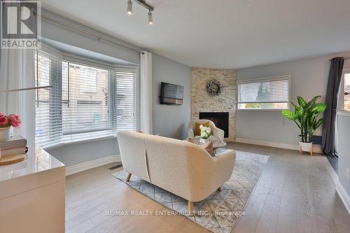 21 - 1385 Lakeshore Road W, Mississauga, ON - Indoor Photo Showing Living Room With Fireplace