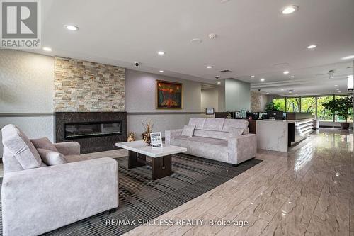 713 - 145 Hillcrest Avenue, Mississauga, ON - Indoor Photo Showing Living Room With Fireplace