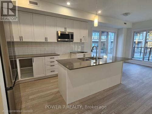 101 - 241 Crescent Bay Lane, Huntsville, ON - Indoor Photo Showing Kitchen With Double Sink With Upgraded Kitchen