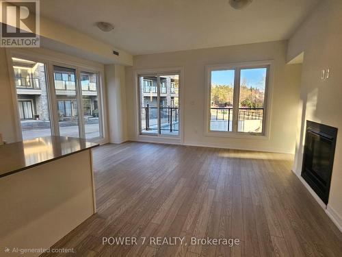 101 - 241 Crescent Bay Lane, Huntsville, ON - Indoor With Fireplace