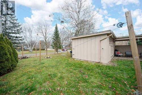 side yard with fence posts installed - 629 Victoria Street, Strathroy-Caradoc (Ne), ON - Outdoor