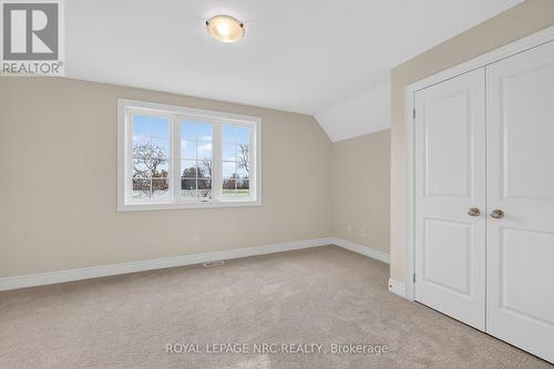 FRONT BEDROOM HAS BEAUTIFUL VIEWS OF OLD FORT EREI - 56 Dominion Road, Fort Erie (Lakeshore), ON - Indoor Photo Showing Other Room