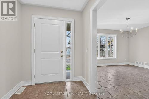 BACK/SIDE ENTRANCE INTO MUD ROOM WITH COAT CLOSET - 56 Dominion Road, Fort Erie (Lakeshore), ON - Indoor Photo Showing Other Room