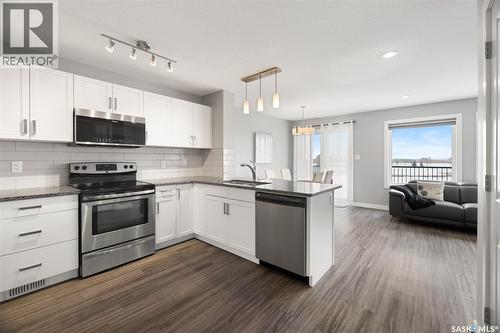 8825 Kestral Drive, Regina, SK - Indoor Photo Showing Kitchen With Stainless Steel Kitchen With Upgraded Kitchen
