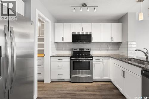 8825 Kestral Drive, Regina, SK - Indoor Photo Showing Kitchen With Stainless Steel Kitchen With Double Sink With Upgraded Kitchen