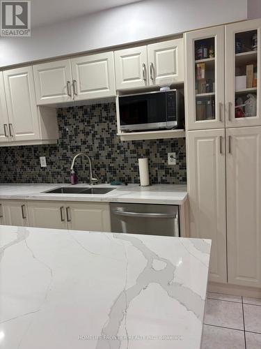 106 Casabel Drive W, Vaughan, ON - Indoor Photo Showing Kitchen With Double Sink