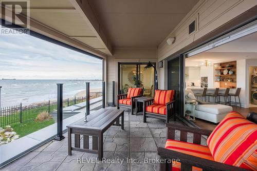 101 - 10 Dalhousie Avenue, St. Catharines (Port Dalhousie), ON - Outdoor With Body Of Water With Deck Patio Veranda With Exterior